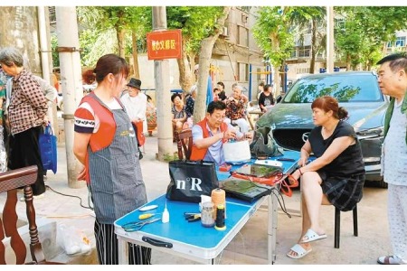 土门西石围小区开展志愿服务  便民便利暖人心